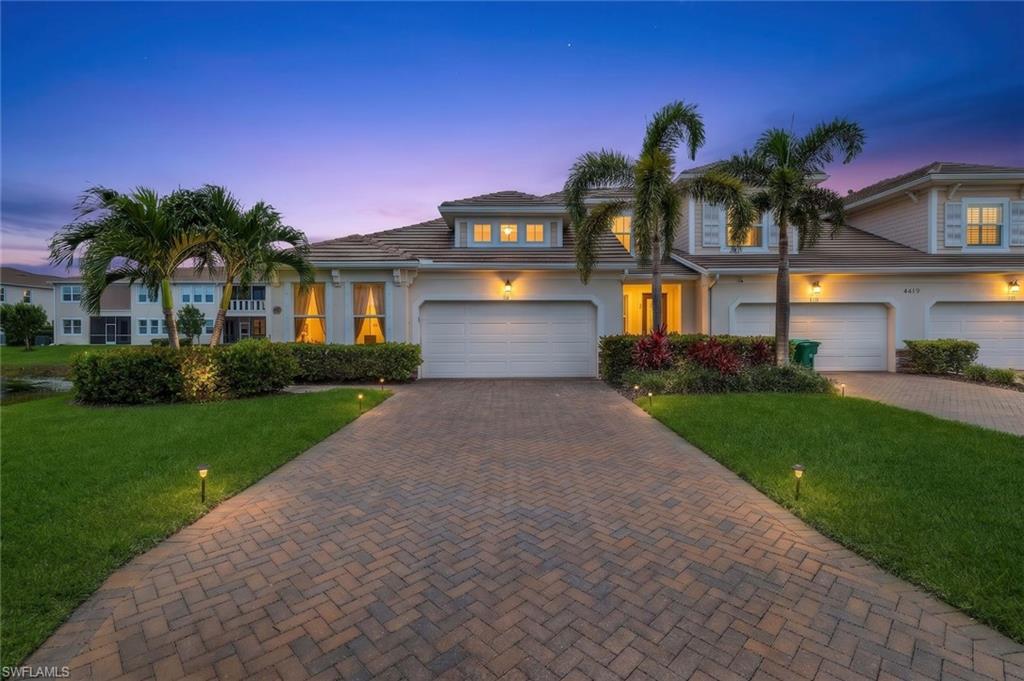 Perfectly positioned within the community, this rare true end residence offers a combination of privacy, natural light, and water views that is seldom available. As a genuine end unit, the property benefits from additional windows, enhanced natural light, and exceptional privacy. From the private entry to the secluded rear lanai, owners enjoy a sense of space and tranquility that is difficult to find in attached residences.  A well designed floor plan that features an open concept making it great for entertaining family & friends.  You will love cooking & entertaining in your kitchen that features a large quartz island with plenty of seating for guests, stainless steel Whirlpool appliance package and walk in pantry.  The spacious primary suite features dual vanities, frameless shower & a generous walk-in closet as well as access to your outside lanai space. You have plenty of room for guests with a spacious guest bedroom as well as the thoughtfully designed den which includes a queen-size custom Murphy bed with additional storage. Additional highlights include a two-car garage, large laundry room with additional storage space, close proximity to guest parking and community amenities. Located outside a flood zone with no flood insurance required, Arboretum is a pet-friendly community offering a resort-style pool, grilling area, and dedicated dog park. Arboretum is located in the Bayshore Arts District where you can enjoy quick access to Downtown Naples, Fifth Avenue South, Gulf beaches, Celebration Park for a fun day of food & music or a dinner out at Naples Bay Resort and Marina. Walk or bike to the Naples Botanical Garden, waterfront dining, East Naples Community Park's world-class pickleball facilities, or a number of fantastic Bayshore area restaurants including Rebecca's, The Med & The Real Macaw. Combining a rare lakefront setting, true end-unit privacy, and one of Naples' most convenient locations, this exceptional residence offers an opportunity to enjoy the very best of the Naples lifestyle.