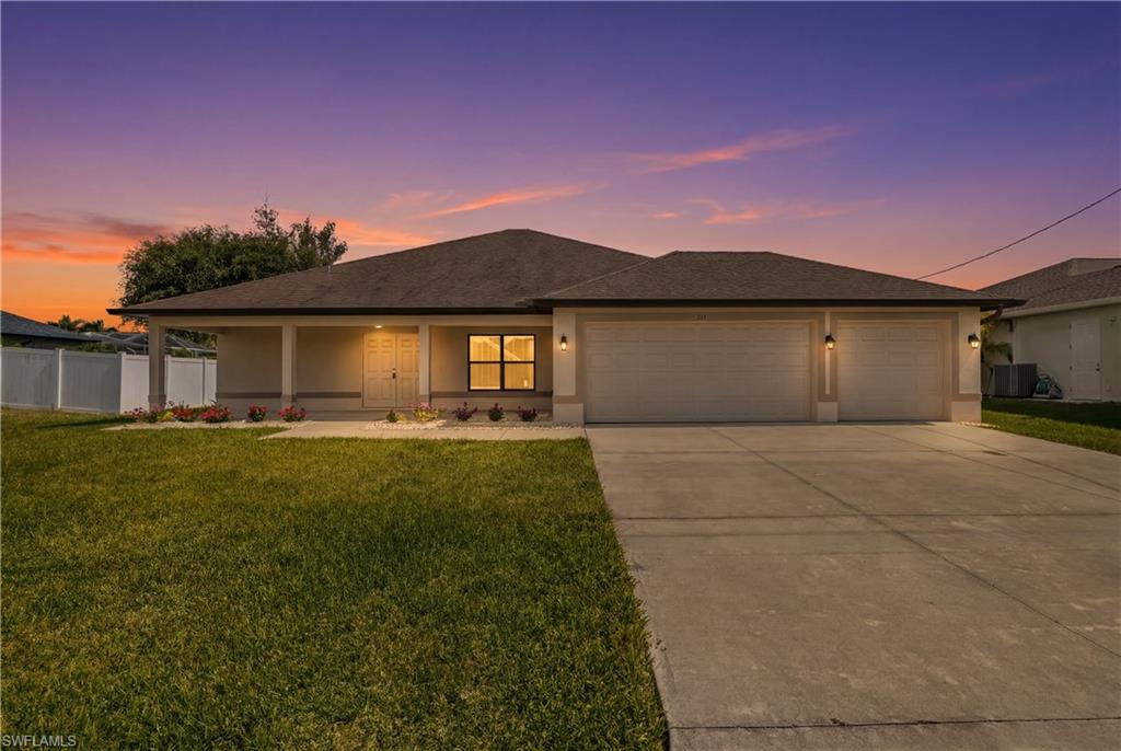 Huge reduction! Waterfront living at its finest! This beautifully maintained newer 4-bedroom, 2-bath home is perfectly situated on a freshwater canal with access to Cape Coral's sought-after chain of lakes, offering endless opportunities for boating, fishing, kayaking, and enjoying the Florida lifestyle.

The open-concept floor plan features tile flooring throughout, stainless steel appliances, a newer A/C system (2024), and plenty of space for family and friends. Outside, you'll love the private dock, screened lanai, charming front porch, and spacious 3-car garage.

Located in one of SW Cape Coral's most desirable neighborhoods, you're just minutes from shopping, dining, parks, and top-rated schools. Best of all, all assessments are paid, and the home is NOT in a flood zone.

Whether you're looking for a year-round residence, vacation home, or investment property, this waterfront gem offers the perfect blend of comfort, convenience, and recreation. Don't miss your chance to own a piece of paradise!