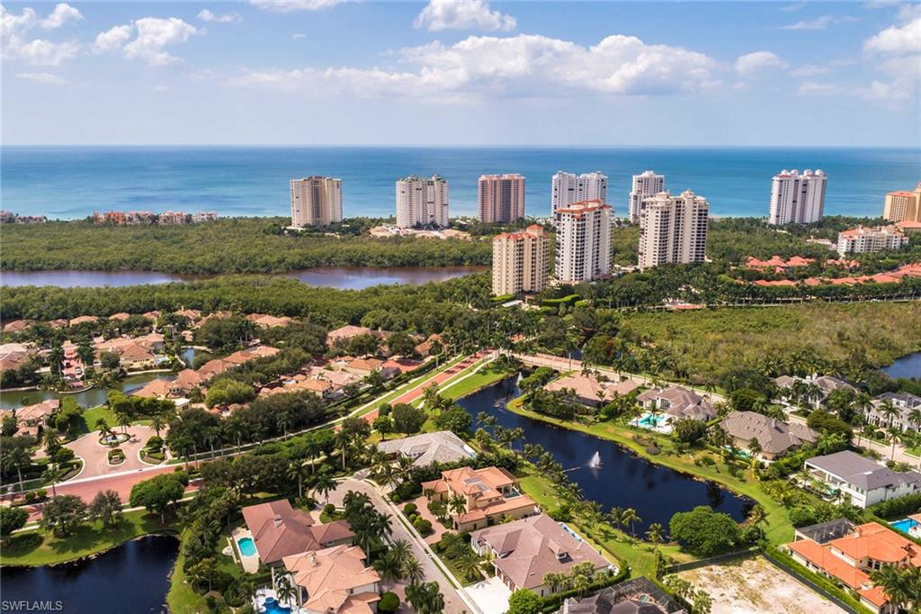 Built by Gulfshore Homes in 2008 this custom designed 4 bedroom plus den lakefront residence is located in Bay Colony, Naples' most exclusive gated beachfront community offering private beach club, tennis and golf and full concierge services. Providing over 6,000 sqft under air, this magnificent home comprises three car garage spaces, volume ceilings, marble and granite finishes, elaborate built ins and an outdoor kitchen, to name but a few. Meticulously maintained and presented, with top drawer specifications this home is in immediate move in condition.