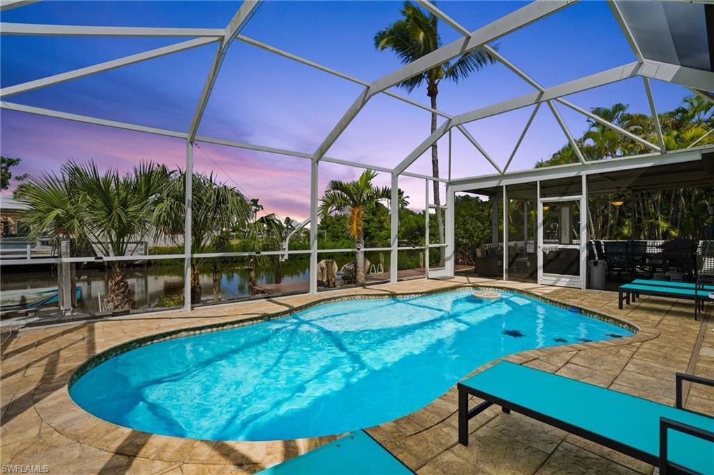 Coastal living meets island convenience in this beautifully updated 3-bedroom, 3-bath gulf-access home in the heart of mid-island Fort Myers Beach. Nestled beside the historic Mound House, this property offers direct Gulf boating access, incredible biking opportunities, and quick access to the beach, local restaurants, and shopping. Whether you’re heading out by boat, bike, or foot, this prime location puts the best of Fort Myers Beach right at your fingertips.