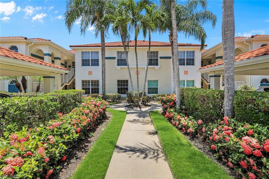 Enjoy tranquil lake and fountain views from this bright and inviting first-floor condo in Lighthouse Bay. Offered TURNKEY boasting 2 bedrooms, 2 bathrooms, and a versatile open den/flex space that's perfect for a extra place for TV viewing, home office, reading nook, or can easily be enclosed to create an additional guest area. A neutral white color palette provides the perfect blank canvas to personalize and make your own. Abundant natural light fills the home, highlighting the serene western-facing lake and fountain views. Begin your mornings or unwind in the evenings on the private screened lanai, where you can enjoy peaceful water views and spectacular Florida sunsets. As an added bonus, the lanai is equipped with electronic hurricane shutters for convenience and peace of mind. The open-concept floor plan offers a seamless flow between the living room, dining area, den, and kitchen, creating a spacious and welcoming atmosphere. Tile flooring extends throughout the main living areas for easy maintenance, while carpet adds warmth and comfort to both the primary and guest bedrooms. The mostly original kitchen features white cabinetry, white countertops, white appliances, and a pantry that provides additional storage space. The spacious primary suite enjoys direct access to the lanai, offering a peaceful retreat with beautiful lake views. The ensuite bathroom includes dual vanities and a walk-in shower for everyday comfort and convenience. A generously sized guest bedroom and adjacent full bathroom provide privacy and comfort for family and visitors alike. With its bright interior, flexible living space, peaceful waterfront setting, and desirable first-floor location, this inviting condo is the perfect place to relax and enjoy the Florida lifestyle. For added peace of mind, the community-wide stone-coated steel roofs were installed in 2020. Located within the gated community of Lighthouse Bay, residents enjoy exceptional resort-style living with access to five swimming pools, including a lap pool, 2.5 miles of scenic walking and jogging paths, tennis courts with a pro on staff, a robust bocce program, two boat houses, a fitness center, sauna, clubhouse, library, and an Arts & Learning Center. As an added bonus, a Bronze Membership to the Brooks Commons Club is included, granting access to a private restaurant, enrichment center, pickleball, and vibrant social programs. Gold Memberships are available for upgrade, providing access to The Commons Club Private Beach with chaise lounges, umbrellas, an ice/water dispenser, conveniently located restrooms, and Beach Parking Reservations during the construction of the new club. Ideally located just minutes from Coconut Point Mall, dining, entertainment, Southwest Florida International
Airport, and pristine Gulf beaches, this home offers the perfect blend of comfort, convenience, and the Florida lifestyle!