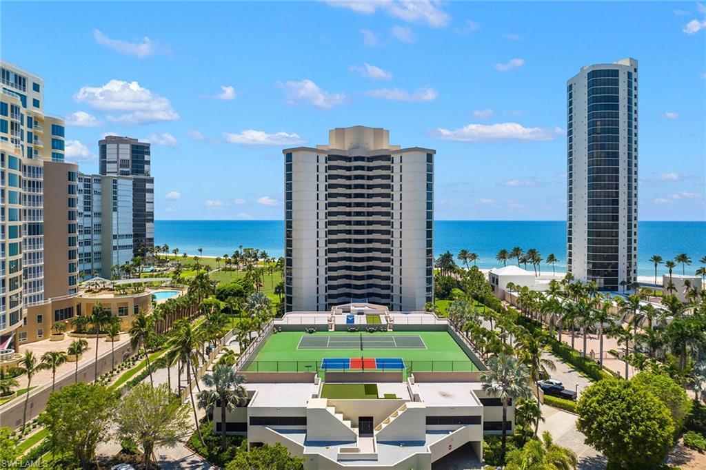 Step inside and experience a world of elegance and sophistication. This chic 10th floor condominium, in the highly sought-after Esplanade Club at Park Shore, boasts a contemporary design that exudes timeless beauty. With a desirable southwestern exposure and gorgeous gulf and beach views, the floor plan lives like a single-family home, creating an ambiance for relaxing and entertaining. With its generous three bedrooms and three full baths, an open living and dining concept, and chef’s kitchen with breakfast nook, the condominium boasts fine finishes, luxury appliances, and offers an extended laundry and storage room, tile flooring, electric blinds, rich woods, along with impact windows and doors and leak detection system. Amazing resort-style amenities, some of which includes 24-hour security, electric car-charging stations, bike, kayak and paddleboard storage, renovated common areas, enhanced social room, fitness center, beachfront pool and spa with sun deck, an outdoor fireplace, gas grills along with a sports amenities area atop the parking garage that includes pickleball, tennis, bocce ball, shuffleboard and a golf chipping net. Esplanade is pet friendly with its own dog park!
