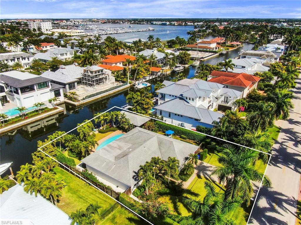 Welcome to 601 17th ave s in Aqualane Shores. This is the single best value in all of the Aqualane Shores/ Port Royal area. Total interior remodel in 2018 . New dock in 2020 with lighting, New a/c in 2017 all new appliances. Gorgeous landscaped areas in front and rear of home. On the water with a covered boat dock and 12000 pound lift. This 3 bedroom two bath home offers easy out to the bay of Naples and the Gulf of Mexico. Walk to the beach and all that 3rd st south has to offer. Fantastic home to live in with nothing to do but move in or build yourself a brand new home.