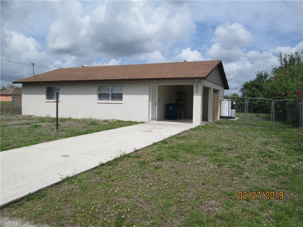 Great starter home with UPGRADES GALORE!!!  This 2 BR/1 BA has all new custom designed kitchen, shaker cabinets with soft-close feature, all new stainless steel appliances, custom tray ceiling with recessed lighting, and plank tile flooring.  All new bathroom with combo tub/shower, new vanity, and plank tile flooring.  New A/C in 2018, upgraded water equipment, new flat roof on covered patio.  Double closets in master bedroom.  Indoor laundry room. Freshly painted inside and out. Spacious fenced in backyard with plenty of space for pool or other outdoor entertainment.  Great location close to Gunnery Rd., with direct access into Fort Myers.  This little gem is spotless and move-in ready, it won't last long!  Call today for your private showing!