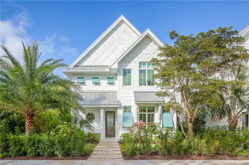STOCK CUSTOM HOMES and MHK bring its superior quality of custom craftsmanship to Olde Naples with the Residences On Sixth. Gathering inspiration from South Hampton, a coastal design aesthetic flows throughout this homes floor-plan by Cinnibar includes four bedrooms, five and one half baths three car garage.Features include: First floor master with private laundry, guests can escape to a private sanctuary-the fourth bedroom cabana suite with  balcony overlooking the pool and a dining nook with built-in banquette and private entrance, oak flooring throughout, central vac, smart home. The Living rooms two-story ceiling mimics the headboard and beam details found in the foyer. Kitchen is equipped with sub-zero, wolf, and miele appliances. Spacious living upstairs boasting family room, laundry room, loft area with beverage station.The charming lanai area includes a salt water pool/spa/pool bath  and a half-height wet wall with LED sheer descent and precast coping, fireplace, tongue & groove ceiling detail and marble pavers. Full Outdoor kitchen with Wolf grill,  and naturekast cabinets. Covered lanai with fireplace has custom roll down shutters and screens. Walk to beach and 5th Ave!
