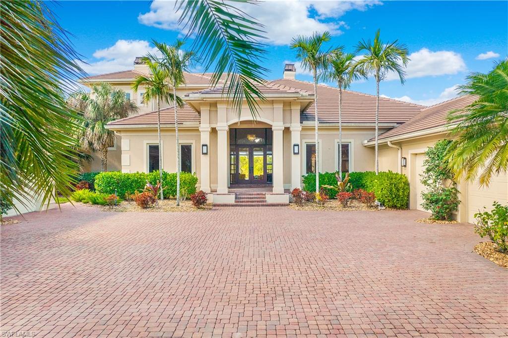 Welcome to the ultimate Florida Luxury lifestyle you have been searching for.  Entertain with elegance and ease in this masterfully updated light and bright home.  This home impresses with a living and family room that transitions seamlessly to over 4000 sq foot of covered and screened Lanai. Enjoy cocktails from your interior built in bar or poolside while watching the sunset over the Preserve. The owners suite boasts his and her separate bathrooms each with their own luxurious walk in closet. Your  guests can relax in luxury and privacy in three upstairs en-suite guest bedrooms which surround their own separate living room and kitchenette leading to a separate enclosed covered balcony.  This incomparable  residence sits on one of the most private lots in the community. NEW roof 2020. Along with its wonderful location, Audubon Country Club offers something for everyone. Audubon’s amenities include an 18 hole golf course, tennis, pickleball, boardwalk, a state-of-the-art the art fitness center and much more. All of this within minutes of the beautiful Gulf Shore beaches and 25 minutes to RSW. This  home is truly unique and must be seen to truly appreciate all it has to offer.