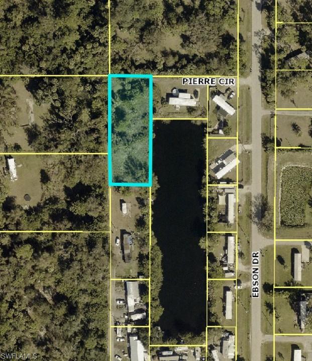 DOUBLE LOT!! Investor special! Two manufactured home lots on a lakefront setting in Suncoast Estates offer outstanding income and development potential. Place two homes for dual rental income or maximize value with a multi-generational setup. Waterfront properties at this price point are hard to find, making this a strong equity play in a growing area of Lee County.