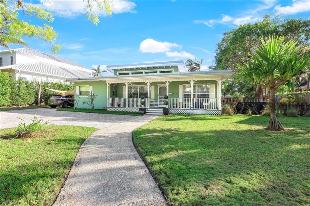 H7718.  Fabulous, large (100 x 150) with preferred southern exposure. Located on coveted 1st Avenue North,  one of Old Naples most beautiful tree lined streets. Desirable alley access behind the home. A wonderful opportunity to develop as you please. Guest house has approx. 720 sq. ft. of living area and 858 sq. ft. under roof. Both of these numbers are included in the overall total area.