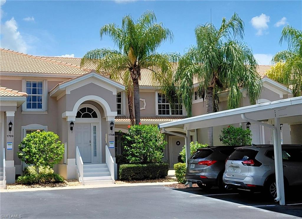 Only a move makes this exceptional, move-in ready, second floor condominium available in the highly sought after Colonial Country Club. Beautifully updated and impeccably maintained, this 2 bedroom, 2 bathroom residence offers beautiful long lake views, quality upgrades throughout, and an opportunity to enjoy one of Southwest Florida's premier gated communities. From the moment you enter, you'll appreciate the attention to detail. Attractive tile flooring with decorative inlaid accents flows throughout the living areas, while the beautifully tiled staircase provides both elegance and easy maintenance. The spacious kitchen features granite countertops, updated cabinetry, GE Profile appliances, recessed lighting, and a combination microwave and convection oven, combining everyday functionality with timeless style. The open living and dining areas are enhanced by soaring cathedral ceilings and expansive sliding glass doors that fill the home with natural light while showcasing the peaceful lagoon beyond. The spacious primary suite enjoys the same picturesque water views and features an updated bath with fresh paint, new fixtures, and updated shower fixtures. The guest bedroom has been freshly painted, and updated window treatments in both bedrooms and the kitchen complete the home's fresh, inviting interior. Major improvements provide added value and peace of mind, including a new tile roof in 2023 and a new HVAC system installed in 2024 featuring a WiFi enabled thermostat. Four variable speed ceiling fans, three with remote controls, provide year round comfort. The screened lanai is the perfect place to begin your day with a cup of coffee or unwind at sunset while enjoying uninterrupted views of the lagoon and Florida's abundant wildlife. Colonial Country Club has recently completed an impressive series of community improvements, all already paid for, including a beautifully renovated fitness and community center, new primary pool decking, and a fully redesigned pay-to-play championship golf course. Residents also enjoy eight pickleball courts, fourteen tennis courts, bocce, scenic walking and biking paths, multiple resort style community pools, an active social calendar, and an outstanding clubhouse restaurant serving breakfast on select days, lunch, dinner, seasonal specials, and community events. Many of the designer furnishings, including quality Broyhill bedroom furniture, along with newer bicycles, golf clubs, pickleball equipment, tennis racquets, beach chairs, umbrellas, tools, and other personal property, may be available separately and are negotiable with an acceptable offer. Whether you're looking for a year round residence, seasonal getaway, or an ideal lock and leave Florida retreat, this meticulously maintained home offers the perfect combination of comfort, convenience, and lifestyle. Although this is a second floor unit, this property comes with transferable flood insurance $646/year plus a 1 year American Home Shield Home Warranty.