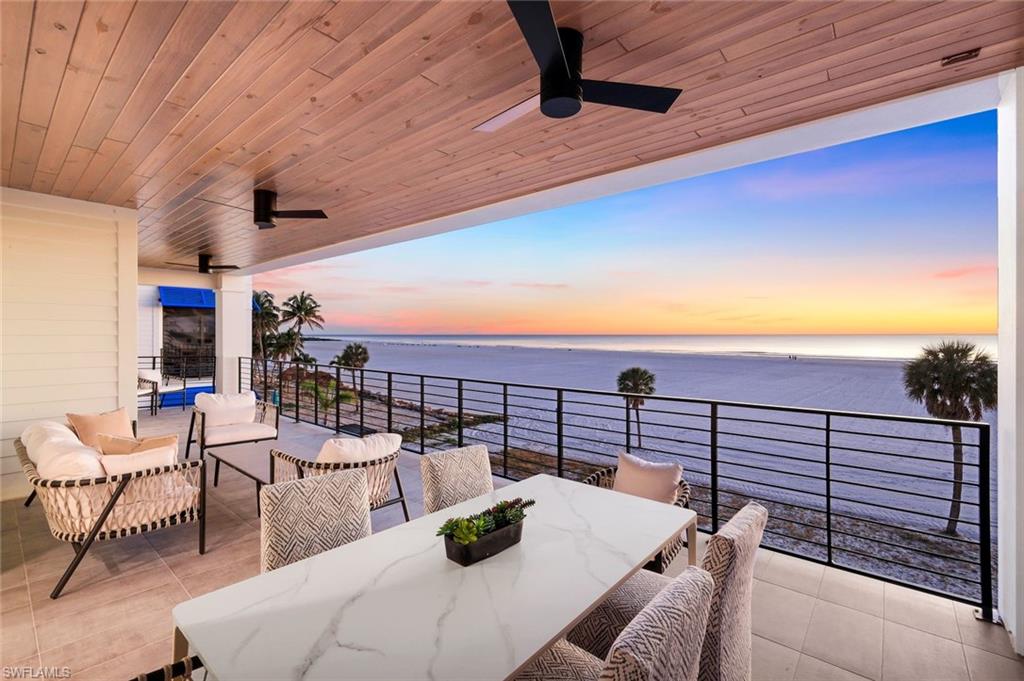 Discover Residence 201 at Gulfside Twelve offering a sophisticated second-floor vantage point where architecture, design, and the natural beauty of Estero Island come together in effortless harmony. Encompassing approximately 4,000 square feet of interior living space, the residence opens to a private Gulf-facing lanai of approximately 700 square feet, creating an elevated outdoor living experience where sunsets and coastal breezes become part of everyday life.

Inside, the residence reflects a refined coastal palette anchored by European white oak wide-plank flooring from the Silvian Collection in the Taivas “Sky” finish, introducing warmth and texture throughout the primary living areas. Large-format stone and porcelain tile selections—including Imperial Onyx White, Atlas Concorde Fray in Gray, and Anthology Bella Tuscana surfaces—add architectural depth and subtle contrast within the baths and secondary spaces.

The chef’s kitchen is designed as a sculptural focal point while maintaining exceptional functionality. Custom cabinetry is paired with curated quartz selections including Valley Grey, Siena, Regalo, Augusta Bay, Nashville, and Santorini Honed, creating a layered composition of natural stone throughout the residence. A professional Thermador appliance suite includes a 36-inch Pro Harmony gas range, paneled refrigerator and freezer columns, wall oven, microwave, and integrated dishwasher. A walk-in pantry, wine refrigeration, and gourmet ice maker complete a kitchen designed for both elevated entertaining and effortless daily living.

A contemporary Amantii Symmetry electric fireplace anchors the great room, while floor-to-ceiling impact sliding doors frame sweeping Gulf views and connect seamlessly to the expansive outdoor terrace.

The primary suite is conceived as a private coastal retreat, offering a spa-inspired bath with dual vanities, sculptural stone surfaces, and an oversized walk-in shower finished with designer tile selections and integrated niches. Premium fixtures by Hansgrohe and Kohler, paired with curated lighting selections throughout the residence, introduce a subtle modern contrast to the warm coastal materials.

Three additional guest suites with private baths, along with a flexible media or lounge space, provide generous accommodations for family and guests. Additional highlights include private elevator entry into the residence, a dedicated laundry room, two secured garage parking spaces, and private storage below the residence.

Gulfside Twelve is an intimate beachfront enclave offering 180 feet of direct Gulf frontage, private beach access, and resort-style amenities including a pool, spa, cabanas, and outdoor grilling areas. 
Ideally located on the south end of Fort Myers Beach, the property sits just minutes from Lovers Key State Park, boutique shopping, and fine dining, with easy access to Bonita Springs, Naples, and Southwest Florida International Airport.