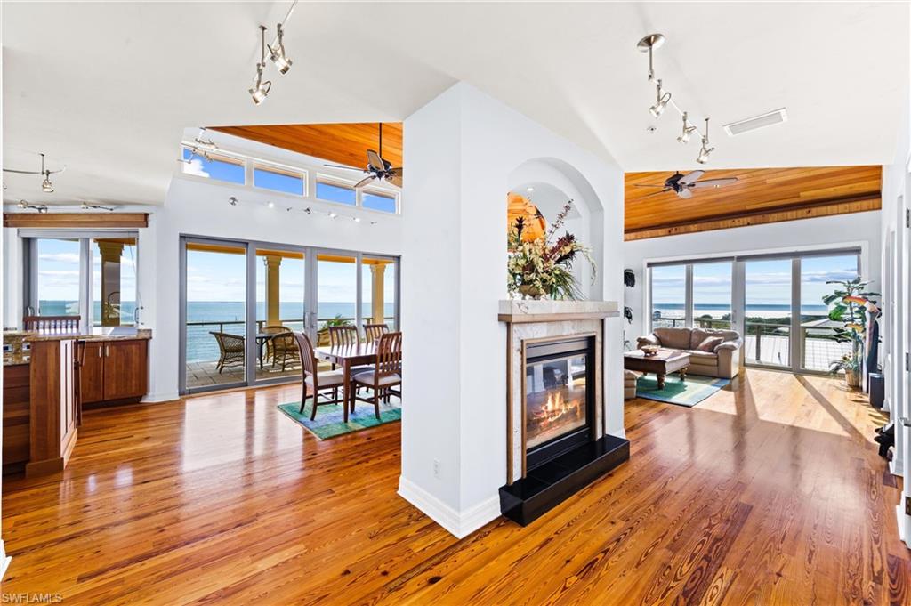 If you have ever dreamed of getting away and enjoying island living at its best, here is your chance. Hop aboard the island ferry on the mainland and prepare to be transported to true island living at its best on North Captiva 
Island assessable by boat or private airstrip only. This ultimate island home boasts a whopping 5886 sf of living space and just under 11,000 sf of space overall. Spectacular water views, sunrises and sunsets abound from nearly every location of the home. Take advantage of the expansive covered porches on levels 1 and 2 as well as a large sundeck on level 3. Enjoy beautiful beach views out of the front of the home and take advantage of the large dock and boatlift at the rear of the property capable of accommodating a boat up to 48' in length and up to a 60,000 lb. weight capacity. The open waters of the Gulf of Mexico are literally at your doorstep.
This home is fitted with a security system, fire sprinkler system, impact glass doors and windows and a whole house generator. There are many beautiful and unique finishes in this home as well as other impressive features that are too numerous to mention. This amazing home is being sold partially furnished.