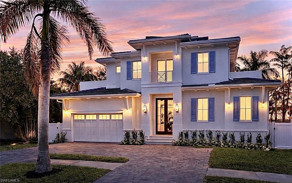 One or more photo(s) has been virtually staged, AI generated or rendered.  Now Complete, 2026 New Construction steps from Olde Naples! This is a unique opportunity to secure a premium custom home with equity in today's market. Priced to attract immediate attention, this Lake Park residence delivers exceptional value in a prime Naples setting. A timeless new construction that offers 4 bedrooms, a versatile flex room, 4 full baths, and a powder bath. Thoughtfully designed to balance functionality, comfort, and refined coastal living, the home showcases elevated finishes throughout, including Thermador panel-ready appliances, custom cabinetry, wide-plank wood flooring, marble bath surfaces, architectural ceiling details, and curated designer lighting. Every element has been carefully selected to deliver a cohesive, high-end aesthetic. The floor plan flows seamlessly from a welcoming foyer into a light-filled great room, an elegant dining space and a chef’s kitchen, creating an ideal setting for both everyday living and entertaining. Zero corner sliding doors connect the interior to a private outdoor living space with a resort-style pool and spa, outdoor kitchen, and expansive pool deck for relaxing and entertaining. Perfectly positioned in the highly desirable Lake Park neighborhood, just minutes from Naples’ pristine beaches, parks, great schools and the vibe of shopping, dining and strolling on the iconic Fifth Avenue South.  This residence offers a combination of the ultimate location, custom design, and exceptional value!