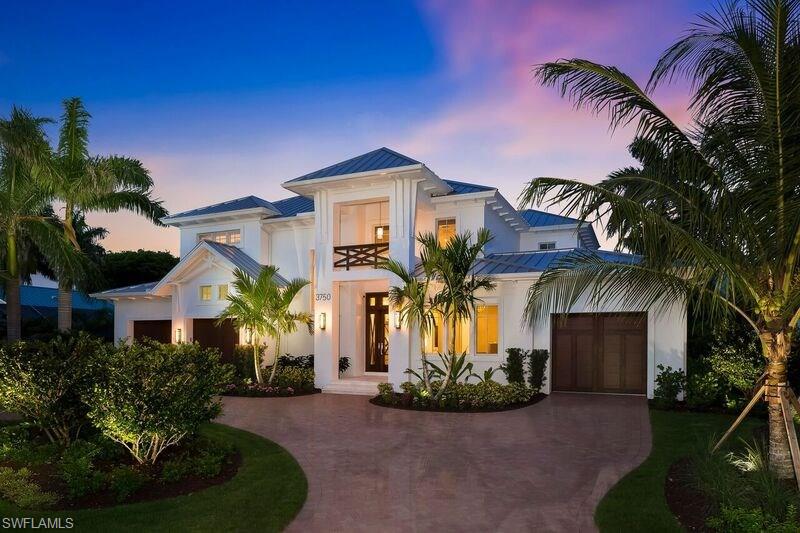 Brand new FULLY FURNISHED model home.Classic old Florida Style nestled in one of Naples most prestigious Neighborhoods, walking distance to exclusive private beach, shops and bistros. Breathtaking Kitchen with double counter space in both Pompeii Pure White Quartz and Pompeii Rock Salt Quartz, with built in Sub-Zero and Wolf appliances , cooling drawer, and wine fridge, and giant walk in pantry. Wine lovers will enjoy the separate corking station with wine fridges.Coastal Elegance redefined with Tongue in groove ceiling details throughout, coastal balustrades up the staircase overlooking the living room which boasts 24 ft ceilings. Incredible outdoor living area, with fireplace, oversized bar and separate built in counter space with grill, refrigerator and specialty ice maker for the perfect drink. Tongue in groove ceilings and electronic drop down screen.
32 ft long pool.Closing price of $3,145,980 includes Real Property Price of $3,128,570 and $17,320.40 for the value of the furnishings that conveyed outside of closing. Closing price of $3,145,980 includes Real Property Price of $3,128,570 and $17,320.40 for the value of the furnishings that conveyed outside of closing.