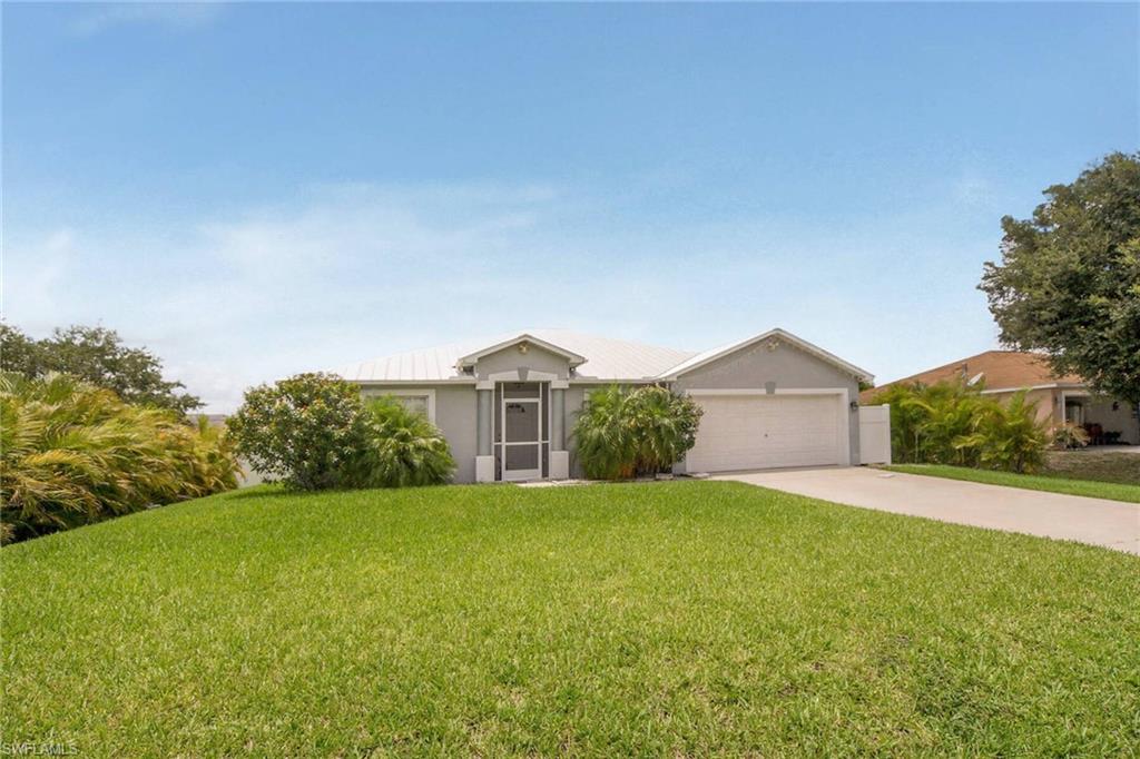 This 3 bedroom home is over 1600 sq ft with 3 bedrooms, 2 bathroom, LIVING ROOM & FAMILY ROOM plus a dining room.  The kitchen features granite countertops, upgraded cabinets and nice high ceilings.  Master bedroom has a tiled flooring with walk in closet. Master bathroom with a separate tub and shower with dual sinks. Guest bedrooms are separate from the master bedroom to allow privacy.  There is a large lanai with a fenced yard. This home is located near shopping, dining and access to I-75.