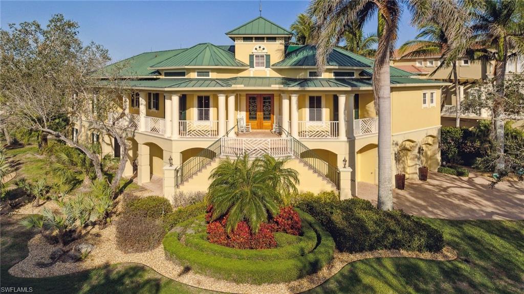 OWNER SAYS SELL! MAJOR PRICE REDUCTION! UNHEARD OF 666 SF PRICE!Custom Hideaway Beach golf course home! Beautifully upgraded five-bedroom plus den, four full- and one half-bath home complete with workout room. An architectural masterpiece with Incredible wood craftsmanship throughout boasting 5,400 square feet under air, for a total of 9,000 square feet. Custom built around one of the largest golf course lots in Hideaway Beach. Gourmet kitchen with Wolf appliances and huge butler's pantry. Family room, great room, kitchen and primary bedroom all open to incredible golf course views. Marble and wood flooring, high volume and double tray ceilings. Incredible detail throughout this beautiful home. This stunning home is complete with a three-car garage and elevator. Many terraces and lanais with southwest views. Enjoy the lifestyle you deserve in this 24-hour gated community on the Gulf of Mexico! Clubhouse on the beach with many dining venues. Golf, tennis, pickleball, bocce ball and much more. Parts of the home are virtually staged.