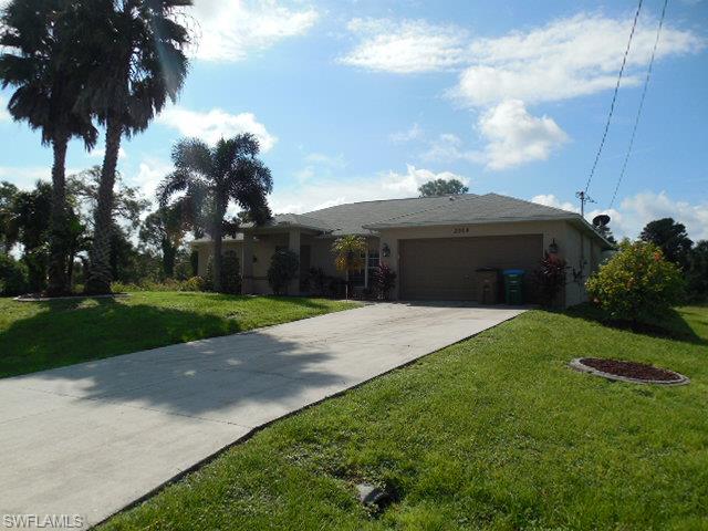 Beautiful 3BD/2BA w/ Den Pool Home with Spacious Layout and Gorgeous Design Located in Quiet Coral Oaks Neighborhood. Home is Tiled Throughout Except for the Bedrooms and has an Open Floor Plan. The A/C, Water Heater and Outside Paint were All Done Last Year. All Appliances are 4 Years Old. There is a Large Covered Paver Lanai Area for Entertaining and a Large Volleyball Style Pool with the Deepest Part in the Middle. The Home Features a Whole House Reverse Osmosis System which Provides All the Water in the Home to be Better than Bottled Water. This Home is a Must See!!! Set a Showing Today!!!