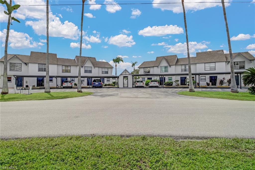 Beautifully updated waterfront end unit town home! This two bedroom one and half bathroom town home, has brand new A/C, hot water heater,and stainless steel appliances. Newly installed tile floors on main level and hardwoods flooring on the upper level. All the interior doors have been replaced.  The main level half bath bathroom has been updated,and the upstairs bathroom completely redone! The exterior was recently painted and new railings installed. New glass in sliding door.
Relax and enjoy the view from your lanai or master balcony. Perfect for sunsets!
Conveniently located in SE near Del Prado Blvd, shopping, and the hospital.