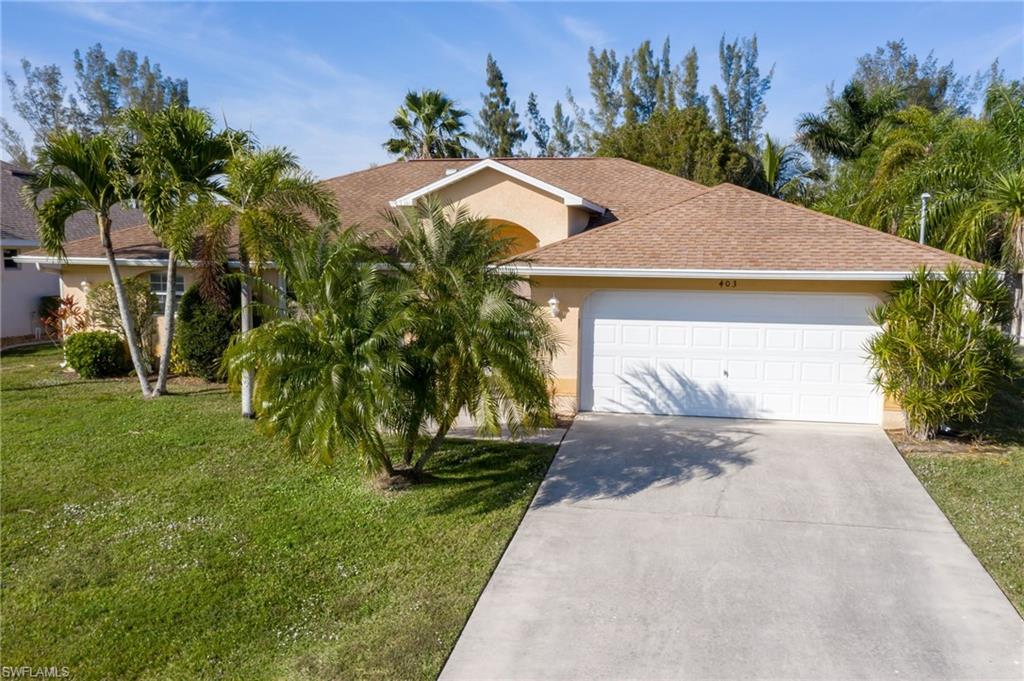 Explore the canals of Cape Coral or you can just relax and fish off your dock. This Florida split floor plan home offers 4 bedrooms, 2 full baths and two living areas, perfect for guests or the growing family. The oversized back yard offers plenty of room to add a pool or expand the screened lanai. Located in a great family neighborhood in the South East, this home is perfectly located close to all Cape Coral has to offer.