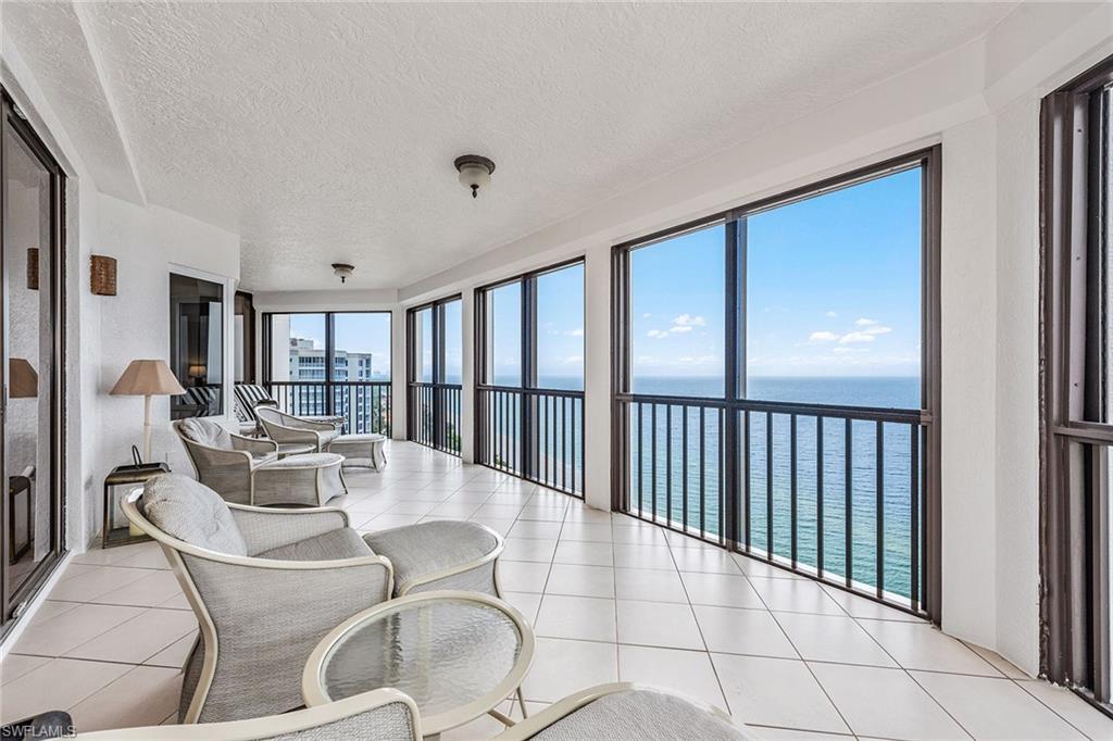 Gorgeous gulf and beach views! High-floor gulf view residence directly on the beach in the private gated community of Bay Colony. Featuring panoramic views of the Gulf of Mexico through hurricane-impact glass picture windows and floor-to-ceiling glass sliders off the main living area and the primary bedroom. This highly sought-after design welcomes you into an elegant entry foyer and spacious living area boasting tile, elegant moldings, lighting and trim and a separate dining area. The open kitchen with casual den area offers plenty of room for entertaining family and guests including two full guest bedrooms, both with en-suite baths. Extra storage at lobby level. The Carlysle amenities include an impeccable lobby with 24-hour staffed front desk, two guest suites, fitness center, social rooms and a resort-style pool. Bay Colony residents enjoy the use of their private beach club and restaurant, a tennis club, as well as use of amenities of Pelican Bay.