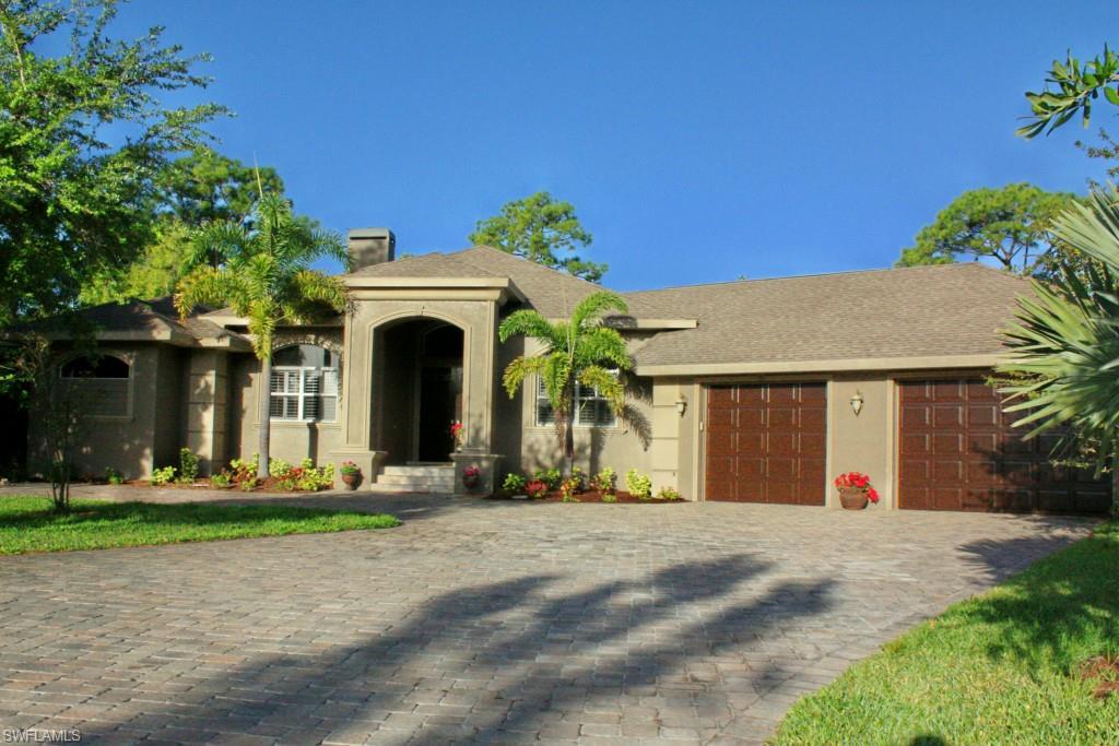 Custom Builder's Personal Spectacular Residence ! Magnificent Craftsmanship and Detail while still looking Pristine New! This Quaint Gated Community on the Caloosahatchee River boasts 1 ACRE Lots for all 20+ homesites where Olde Florida charm abounds with Moss Covered Oak Trees lining the yards. Attention to Detail is prominent in this Estate: Crown Molding in EVERY room, including Laundry, Baths, and Triple leveled in the Main Rooms. Granite Kitchen with Stainless Appliances, Wine Cooler, Hi-End Wood Floors and Inlays throughout, Wood Fireplace in beautiful Great Room, and Master Suite is an Absolute Palace. If you like Elbow Room, there's an 1100+ sqft Garage for your two Cars and Another 465 sqft separate Garage for your Toys, which is surrounded by HUGE Brick Pavered Entertainment area with Fire Pit and Screened Baseball Cage. The list continues to grow with a full service Summer Kitchen covered by the Large Lanai with Cedar Ceiling and Inset lighting all looking onto the Oversized Pool. SIMPLY AMAZING !