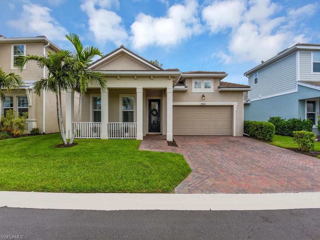 Luxury features throughout! This single family home is extremely deceptive from the curb- it has a quaint curb appeal w/ open porch, cottage-style detail on soffit, beautiful pavers on driveway & walkways... yet inside there is a sprawling layout, open concept living design, high-end light fixtures & fans, tile flooring in main living areas, den w/ French door entry, volume & tray ceilings, frameless glass on master suite shower, custom shelving & storage system in master suite walk-in closet, plantation shutters, disappearing sliders to lanai elegant glass front door, & more! You will LOVE the outdoor living space w/ huge screened lanai, covered sitting area, custom shade, and summer kitchen. Compass Landing is situated in a highly desired area of Naples and offers a community center w/ activities for everyone! Very convenient location- close to lots of shopping/dining options, less then a half hour drive to the beaches lining the Gulf Coast & the world famous Naples 5th Ave, short drive to public golf courses, Collier County public parks, and highlighted attractions of Naples like the Naples Zoo @ Caribbean Gardens.