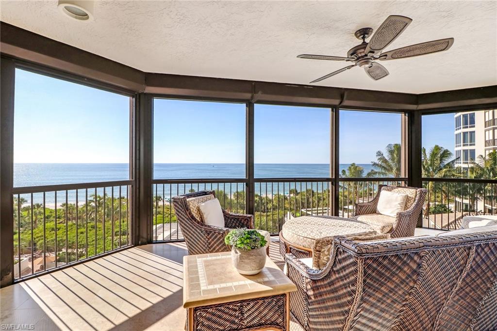 C.16830 - Masterfully remodeled and beautifully furnished end-unit condo located in prestigious Biltmore in Bay Colony. Enjoy stunning gulf views and endless sunsets from this 5th floor residence. This well appointed residence is designed to offer a relaxing coastal ambiance throughout, complemented by soft white-blue toned furnishings, set off by stunning wood flooring throughout the living areas, crown molding, and recessed lighting. The Grand Salon offers custom wall built-ins, tray ceilings, recessed lighting, wet bar all looking out to the amazing backdrop of the Gulf of Mexico.  Reformatted open floor plan allows you to flow with ease through the main living areas and in to your delightful chef's kitchen. This well thought out kitchen boasts huge center island, glass cook top, marble counter tops, custom-crafted cabinets, refrigerator, pantry, built-in wall oven and microwave. Your very own wine cooler to store your favorite wine comes with two refrigerated drawers. This split floor plan is designed with the master facing the Gulf. Two guest en-suites bedrooms with private baths offering a shared screened-in lanai. Relax by the resort-style pool with your own private cabana.