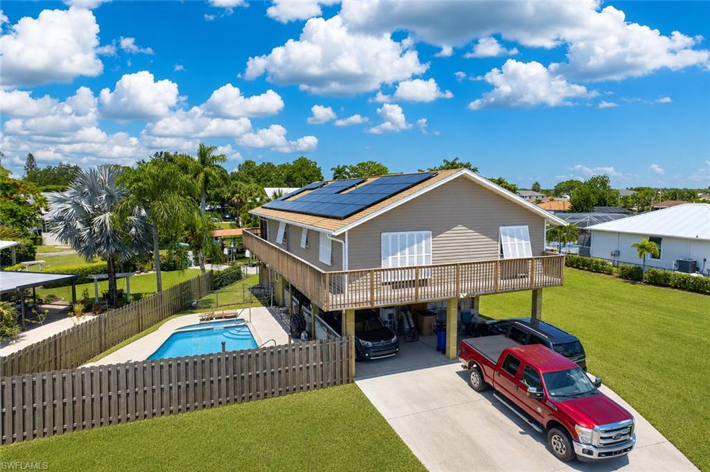 Enjoy the best of Florida waterfront living in this canal-front pool home located in the desirable Fort Myers Shores community. This 3-bedroom, 2-bath residence offers over 1,500 sq ft of living space with a bright, open layout designed for both everyday comfort and entertaining.

A standout feature is the one bedroom one bath with kitchen private first-floor guest suite, ideal for extended family, visitors, or potential rental income—offering flexibility that today’s buyers are actively seeking.
Step outside to your own backyard retreat featuring a screened uper deck, pool/spa, and tranquil canal views—perfect for relaxing evenings or hosting guests. With direct waterfront access, this property is a great fit for boating enthusiasts and those looking to embrace the Southwest Florida lifestyle.

Situated on a generously sized lot with no HOA, this home provides convenience, freedom, and strong upside potential. Whether you're searching for a primary residence, seasonal getaway, or investment opportunity, this property checks all the boxes.