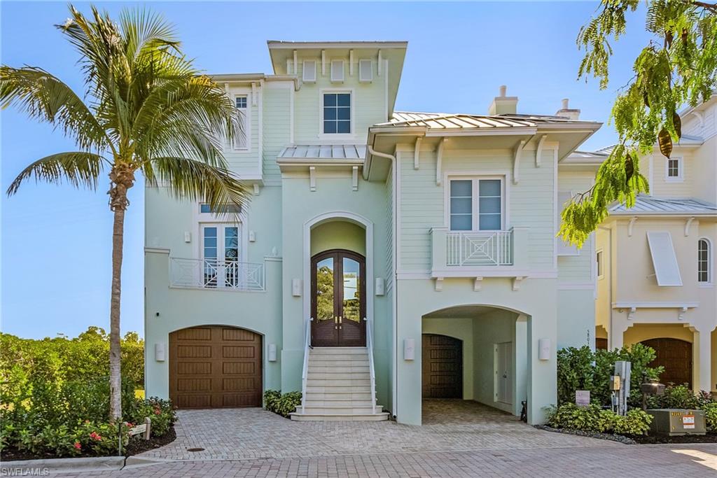 One of the best bay properties on Bonita Beach is now available for purchase! Located on the best lot in the gated community of Cape Hickory this 3 story home offers the ultimate in waterfront living including: it is situated across the street from the beach with easy access to beautiful Bonita Beach, home is on the tip of the large peninsula with bay water views in every direction, most desirable south exposure provides light throughout the house and on the infinity edge elevated swimming pool & spa, unparalleled privacy, bay views from every room, premier boating from your private dock & lift providing easy access to the Gulf waters and best of all a timeless coastal island style exterior and interior that has been maintained in immaculate condition.  The 4,477 AC SQ. FT. provides an open spacious floor plan and the 9,099 SQ. FT. total living area provides an immense elevated outdoor covered and open lanai areas around the pool, spa, summer kitchen, pool bath w/ shower, two story screened enclosure plus upper floor decks and a car collectors garage with storage and more storage.  The main living level consisted of a double island kitchen with seating for 4, 48” gas range, subzero refrigerator/freezer, two dishwashers, classic custom white cabinetry, light exotic stone counters that opens to the dining and great rooms which all open to the lanai and pool via 10’ pocketing sliding doors that make inside and outside areas seamless for entertaining and personal enjoyment. The office, half bath, guest bedroom 4 with en-suite bath, laundry room and wet bar complete the main floor. The upstairs living level feature a large owners bedroom with a deck overlooking the bay and pool, closets for year round living, master bath with oversized shower, tub, large his & her vanities and wet morning bar area.  Guest bedrooms 2 & 3 both with en-suite baths & decks with bay views and a second laundry complete the 3rd story.  Other amenities include wood flooring, designer plumbing, light fixtures, tile & marble baths, a private elevator, covered car area in front of garage door, programmable smart home with iPad/phone controls for lighting system-cameras-security-remote access-pool controls, the exotic stone countertops air throughout, impact doors & windows, concrete construction, standing seam metal roofs, & the highest quality millwork and available. This home is beautifully furnished for immediate closing and move in.  Cape Hickory is the only single family home gated community on Bonita Beach and is a short drive to Mercato & Coconut Point Malls, shopping, dining, entertainment, golfing, and RSW International airport plus there are new restaurants and more coming close by.