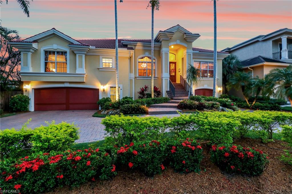 HUGE Price Adjustment!  Whether its boating, beaching or great restaurants and night life you love, it doesn’t get any better than this location! Situated in one of the sweetest spots in Naples and steps from the Yacht Club and 1.5 blocks off 3rd Street S. with its renowned shopping and dining. Gulf access w/ no bridges, Southern exposure and walking distance to the white sandy beaches of the Gulf and Naples Pier, this home offers a 65' Trex composite dock complete w/lighting, deep water dockage, 10,000 lb. boat lift, water/power and fish cleaning station. Open floor plan w/gourmet kitchen, large island and buffet. Stainless top of the line GE Profile appliances plus built-in wine storage for chilled and room temp combine with a large family room and make this the perfect home for entertaining. Large Mstr bdrm, spa-like ensuite w/soaking tub, glass enclosed shower, dual vanities and 2 large walk-in closets w/built-ins.  Bdrms 2 & 3 accommodate King furnishings. The beautiful 3 bdrm+den features a 6 car garage w/multi-use space/storage, oversized elevator, expansive deck w/screened lanai, pool w/sunledge, spa and outdoor kitchen all combine w/ swaying Palms and gorgeous sunsets.