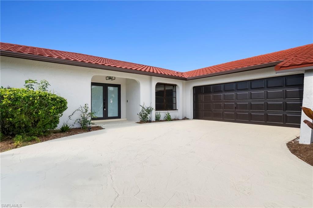 Completely remodeled Gulf-access waterfront home offering modern finishes, quality upgrades, and exceptional boating amenities. This move-in-ready residence features a new standing seam metal roof (2023), luxury vinyl plank flooring throughout, updated lighting and fixtures, and an open floor plan designed to maximize natural light and canal views.

The remodeled kitchen features white shaker cabinetry, quartz countertops, a large center island with seating, premium LG stainless steel appliances, and abundant cabinet storage. The spacious primary suite offers private access to the lanai and pool area along with a beautifully updated en-suite bath featuring contemporary finishes. Two additional guest bedrooms and an updated guest bath provide flexible living space.

Outdoor living is highlighted by a recently resurfaced pool enclosed within a new panoramic screen enclosure that provides wide, unobstructed canal views. The expansive covered lanai creates an ideal space for relaxing or entertaining while enjoying the waterfront setting.

Designed with boating enthusiasts in mind, the property includes a private composite dock with captain’s walk, a 10,000-pound boat lift, and Gulf access, providing convenient access to Southwest Florida’s waterways.

Additional features include luxury vinyl plank flooring throughout, quartz countertops, premium LG stainless steel appliances, updated interior finishes, modern lighting, a new panoramic pool cage, resurfaced pool, composite dock decking, captain’s walk, and a 10,000-pound boat lift.

A combination of extensive renovations, quality improvements, and Gulf-access waterfront living makes this an outstanding opportunity in Cape Coral.

* Roof: Metal (2023)
* Waterfront: Gulf Access Canal
* Boat Lift: 10,000 lb
* Dock: Composite Dock with Captain’s Walk
* Pool: Private, Resurfaced
* Pool Enclosure: Panoramic Screen
* Appliances: LG Stainless Steel Appliance Package
* Flooring: Luxury Vinyl Plank
* Kitchen: Quartz Countertops, Island, Shaker Cabinets
* Construction: Concrete Block
* Lanai: Covered & Screened