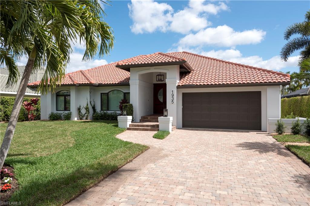 COMPLETELY UPDATED IN 2015 including the Roof, Impact Windows/Doors, Full Kitchen with High End Stainless Steel Appliances, All Bathrooms, All Flooring, and a Reinforced Seawall!  Plus it is being sold fully furnished after a fresh refresh at the beginning of 2022!!  With 80' of water frontage, a 50'+ dock, 10k lb boat lift, direct gulf access with no bridges, and a canal scheduled for deep dredge by fall of 2022, this home is a boaters dream!  Rare to see, this home was built much higher than most and comes with an elevation certificate.  A large rear lanai overlooks the lower patio and pool with its own private pool bath, outdoor shower, and built-in cooking station.  The main living space inside features a massive kitchen as well as vaulted ceilings that make this home feel very spacious.  The master suite is a generous size and has a lot of natural light with a gorgeous master bathroom with dual sinks, large walk-in tiled shower, and jetted tub.  The two guest bedrooms are split from the master and share a well appointed guest bathroom.  From front to back, this home is ready to go, just grab the keys and enjoy easy living in the heart of one of Naples best boating communities!