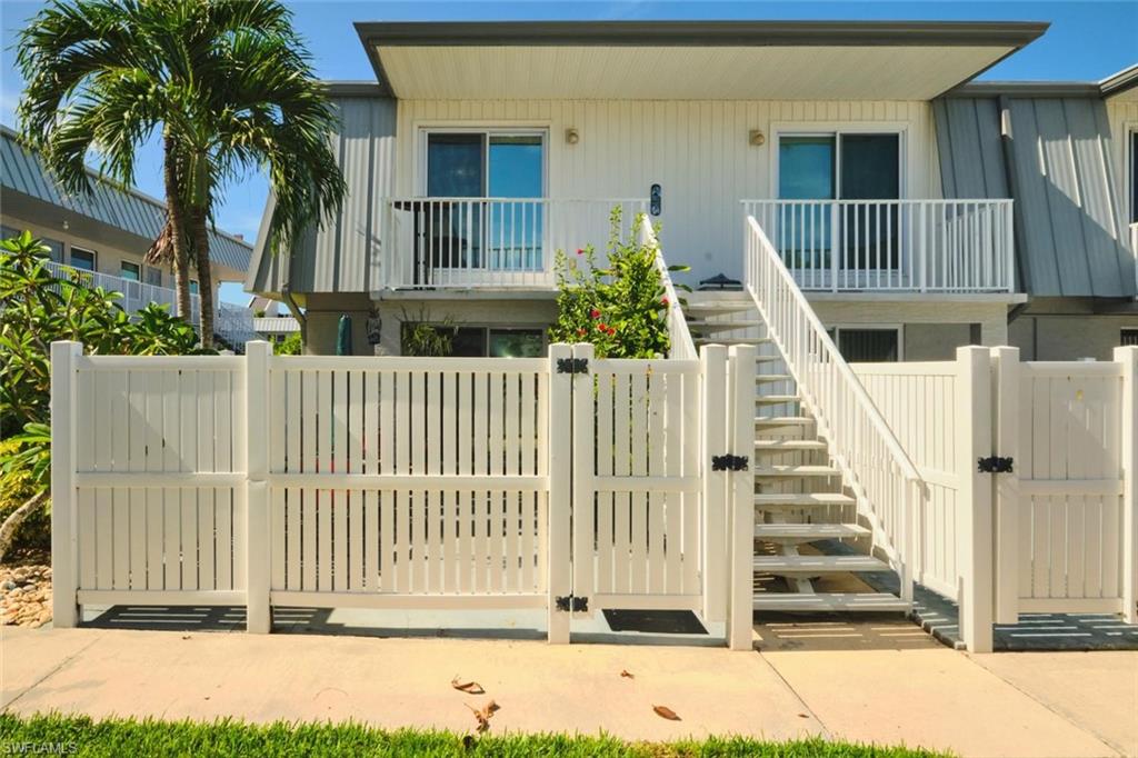 Experience the Florida lifestyle you've been dreaming of at The Regency Condominiums, a tropical resort-style community in one of Fort Myers' most desirable locations. Just minutes from Fort Myers Beach, Sanibel Island, shopping, restaurants, movie theaters, parks, hospitals, and more, this beautifully maintained 2 bedroom, 1.5-bath end-unit townhouse offers the perfect blend of comfort, convenience, and privacy.

As an end unit, you'll enjoy additional natural light and extra privacy, along with a fenced courtyard that's ideal for relaxing or entertaining. Upstairs, the private balcony overlooks the community's outstanding amenities, while screened doors throughout the home invite refreshing Florida breezes inside. The kitchen features granite countertops, stainless steel appliances, and plenty of cabinet space. Both bedrooms offer generous closets, complemented by additional storage throughout the home. For added peace of mind, the A/C was replaced in 2023, and the property experienced no flooding during Hurricane Ian.

The Regency offers an exceptional lifestyle with resort-style amenities including a large saltwater pool, hot tub, fitness center, clubhouse, billiards, library, shuffleboard, BBQ and picnic area, oversized Tiki Hut with TVs, vehicle wash station, and laundry facilities conveniently located just steps away. During season, residents enjoy an active social calendar featuring happy hours, card games, holiday celebrations, and live DJ entertainment.

Located adjacent to Cypress Lake Country Club and with a convenient bus stop at the entrance providing transportation to the beaches, shopping, and the airport, this home is perfect as a full-time residence, seasonal retreat, or investment opportunity. Don't miss your chance to own a piece of paradise in the heart of Southwest Florida!!!!!