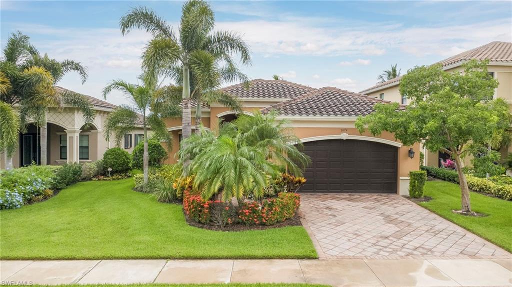 Beautifully appointed waterfront home in the vibrant Riverstone resort-style community located in sunny Naples, Florida, developed by the highly acclaimed GL Homes. Open floor plan with plenty of natural lighting, 2 car garage with separate laundry area, hurricane shutters throughout with some impact windows. screened patio with paved liana, custom crown molding and custom blinds. Newer A/C unit and refrigerator. Community features 24 hour manned gated community with resort-style pool, lap pool, children’s wading pool, and whirlpool spa, state-of-the-art fitness center and yoga studio, five lighted Har-Tru tennis courts, indoor and outdoor basketball and pickleball courts, activities room, game room, and covered party pavilion, A reservable social room with a full catering kitchen and complimentary community Wi-Fi.