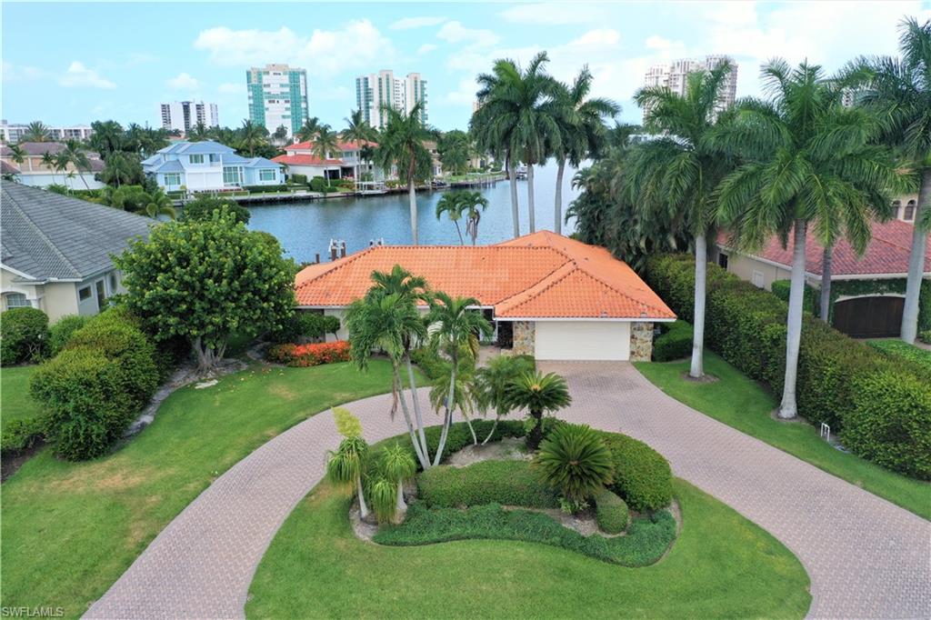 Single Family Home | Waterfront Lot | Seawall | Boat lift | Dock | Gulf Access

Property faces west and provides beautiful direct view of Inner Doctors Pass and amazing sunsets.

Property is being sold AS-IS.  Property is being sold for lot value.