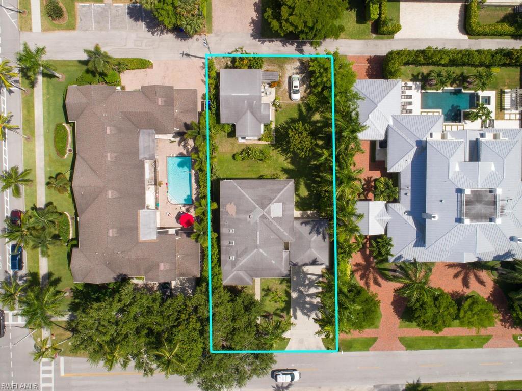 Zoning Verification Approval Letter in Hand,  This gracious lot is ready for you to create the home of your dreams. Currently this lot boasts 4 bedroom 4.5 bath main home and  2 bedroom 1 bath guest house, which are perfectly situated in the heart of desirable Olde Naples. Just a short stroll to some of the best dinning and shopping in all of Naples. Right off of 3rd Street South, 1.5 blocks from 5th Ave South and less than 2 blocks from Olde Naples beloved Wedding Beach. Live your best life by the pristine beaches of the Gulf of Mexico and enjoy some of the world’s best sunsets. This is truly one of the last great opportunities on 8th Ave South to create your own slice of paradise.