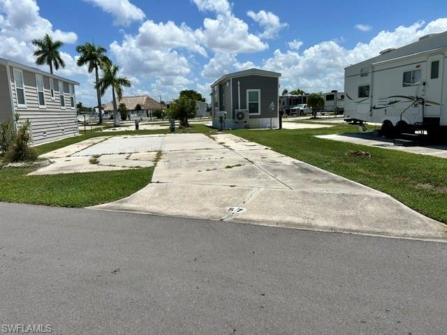 Vacant lot ready for your RV or new manufactured home in a desirable 55+ community! This well-located homesite offers an exceptional opportunity to enjoy affordable Florida living just minutes from area beaches, shopping, dining, golf, and entertainment.

Residents enjoy low HOA/maintenance fees and outstanding community amenities, including two swimming pools, pickleball courts, tennis courts, shuffleboard, a large clubhouse with cabana, and an active social calendar with year-round activities and events.

Whether you're looking for a full-time residence, seasonal getaway, or winter retreat, this community offers the perfect combination of low-maintenance living, resort-style amenities, and an unbeatable location. Bring your RV or install a new manufactured home and start enjoying the Southwest Florida lifestyle you've been dreaming of.

Excellent location, affordable ownership, and endless recreational opportunities—don't miss this chance to own your piece of paradise!