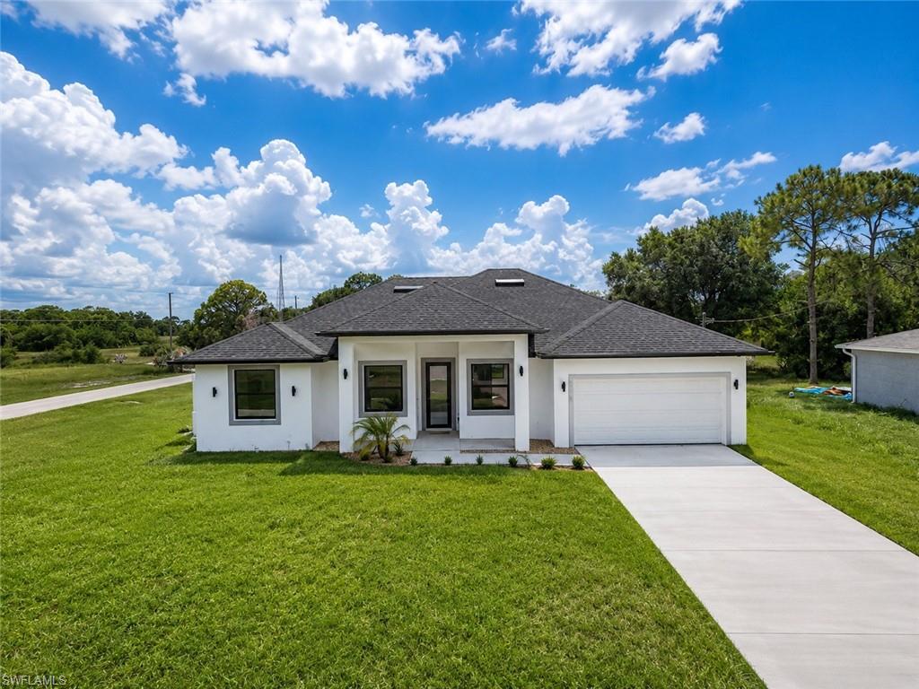 NEW CONSTRUCTION | DUAL SUITE DESIGN | OVERSIZED CORNER LOT | 4 BED + DEN | 3 BATH | 2-CAR GARAGE

Experience modern Florida living with style, comfort, and flexibility in this beautifully designed new construction home at 6038 Kumquat Cir, LaBelle, FL. Situated on a spacious 0.29-acre corner lot, this exceptional residence offers 4 bedrooms + den, 3 full bathrooms, and a 2-car garage, designed for today's lifestyle and multigenerational living needs.

One of the most desirable features of this model is its rare dual-suite layout. In addition to the luxurious primary suite, the home includes a second private en-suite bedroom complete with its own bathroom and walk-in closet, creating the perfect setup for extended family, guests, in-laws, or anyone seeking additional privacy and comfort.

Step inside and enjoy soaring tray ceilings, abundant natural light, elegant oversized porcelain tile flooring throughout, and an open-concept design that creates a seamless flow for everyday living and entertaining. The contemporary kitchen showcases sleek cabinetry, quartz countertops, stainless steel appliances, stylish finishes, and a spacious center island overlooking the living and dining areas.

The primary suite offers a true retreat with a spacious walk-in closet, dual vanities, and a beautifully designed walk-in shower. The additional den/flex room provides endless possibilities and can easily serve as a home office, media room, gym, or playroom.

Enjoy the Florida lifestyle from the covered lanai overlooking the oversized corner lot, offering plenty of outdoor space for entertaining, future additions, or simply relaxing and enjoying the surroundings.

Conveniently located near schools, shopping, dining, and major roadways, this home combines modern elegance, smart design, and functional living in one exceptional property.