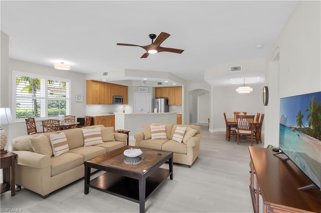 SKIP THE WAITLIST! J.W. Marriott TRANSFERABLE, SOLD-OUT FULL SOCIAL & BEACH MEMBERSHIP. Start enjoying the Hammock Bay and JW Marriott lifestyle immediately in this pristine, turnkey furnished 3 Bedroom, 2 Bath residence perfectly positioned overlooking the second green. Light, bright, and beautifully maintained, this home features upgraded cabinetry throughout, stunning wood plantation shutters in every room, and gorgeous oak-look flooring that adds warmth and style throughout the living spaces.

The open-concept floor plan is comfortable and inviting, offering plenty of room to relax or entertain while taking in the peaceful golf course views from your private lanai.

Your membership unlocks access to two exceptional clubhouses and resort experiences. At Hammock Bay Club, enjoy a resort-style pool and hot tub, poolside food and beverage service, tennis and bocce courts, tiki bar, fitness center, and a full calendar of social events. At the JW Marriott Marco Island, enjoy daily beach access, resort pools, complimentary parking, beach service with lounge chairs and an umbrella, plus exclusive discounts on dining, shopping, and spa services.

Whether you're searching for a full-time residence or a seasonal retreat, this move-in-ready home offers the perfect blend of golf course living, resort-style amenities, and immediate access to one of Marco Island's most sought-after memberships.