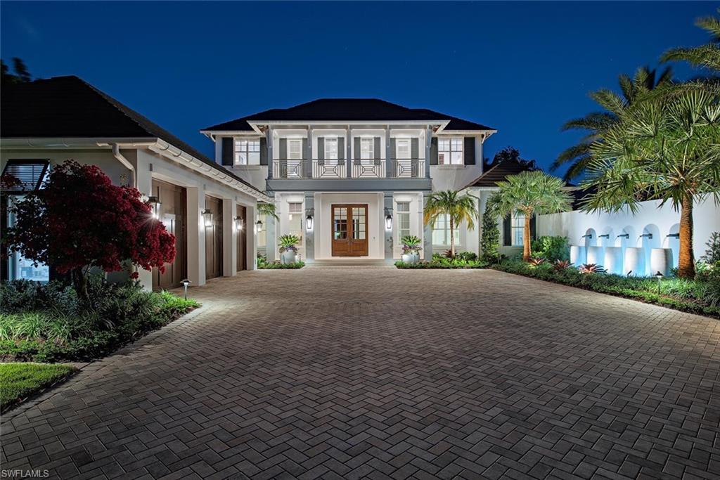 Poised on the shimmering waters of Smugglers Bay in prestigious Port Royal, this Stofft Cooney–designed West Indies-style estate is a rare jewel in today’s luxury market. Developed and sold by the esteemed VIV Homes in 2021, the residence offers nearly 8,000 square feet of impeccably maintained living space, featuring 5 bedrooms plus a dedicated study. The home feels virtually brand new and is located just moments from the exclusive Port Royal Beach Club on Fort Charles Drive. Showcasing an unrivaled fusion of craftsmanship, design, and panoramic views, every detail of this residence reflects quality and sophistication. Highlights include full concrete construction, Legno Bastone wide-plank wood flooring, dual gourmet and service kitchens with bespoke cabinetry and Cristallo Prime countertops, a built-in wine wall, and premium finishes throughout. The expansive open-concept layout seamlessly connects interior and exterior living, perfect for entertaining. The outdoor space is a true retreat, complete with a resort-style pool and spa with sun shelf, a fireplace, waterside fire pit, fully remastered landscape in 2025, and automated roll-down screens and shutters. Substantial fixed and floating dockage accommodates lift access, power, water, and seating—ideal for boating enthusiasts. This extraordinary property offers immediate Port Royal Club eligibility and represents a flawless blend of luxury, location, and lifestyle. Every element has been meticulously considered to deliver a living experience of the highest caliber.