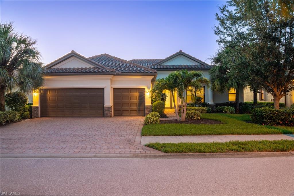 Living the Ultimate Florida Lifestyle begins here!!! This stunning lakefront pool home is located in desirable Reflection Isles. Upscale gated community with the prime Daniels Parkway location. With over 2,300 Sq Ft of living area, 3 bedrooms + den, 3 baths, extended lanai and 3 car garage...this one has it all. Spacious kitchen with newer appliances, granite counters, breakfast bar, pantry, plenty of cabinet space and custom lighting. Master suite features patio access, sitting area, two walk in closets, dual sinks, separate tub and shower + water closet. Well appointed guest bedrooms, indoor laundry room and large home office/den are just a few of the extras you will find here. Additional details include vaulted ceilings, plantation shutters, custom exterior shutters and electric screen on lanai. This home is perfectly situated on this premium lot with impressive water feature and lake views. Lush landscaping, oversized screened lanai and beautifully designed pool will give you the perfect tropical feel. Reflection Isles is a resort style community with fabulous amenities that include clubhouse, community pool and tennis courts. Don’t let this truly magnificent home pass you by!