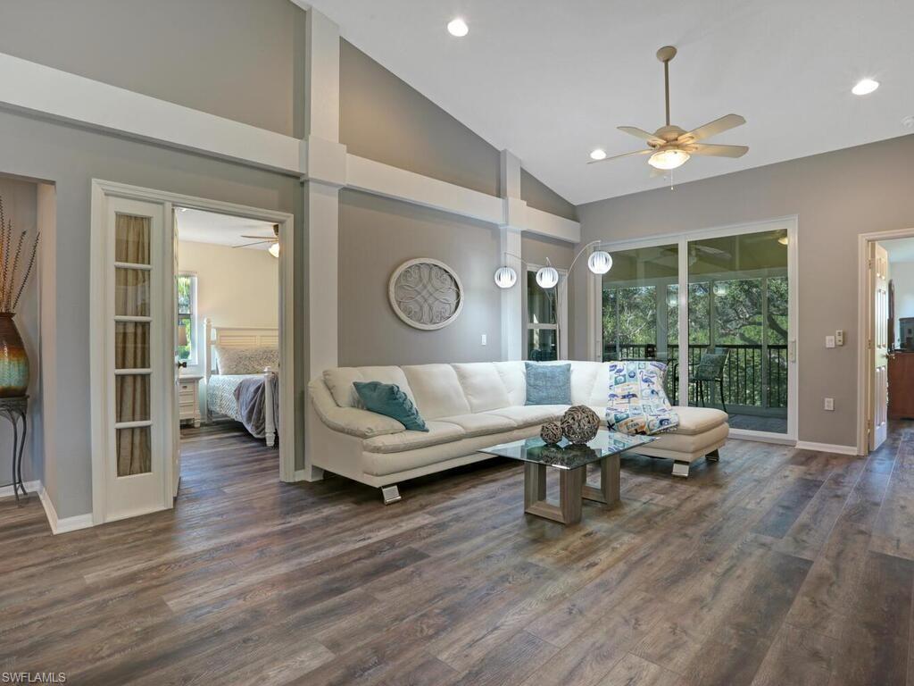 Beautiful, peaceful, 3 bed, 2 bath coach home w/ attached garage lives very large with vaulted ceilings and stunning architectural details. This home is well-cared-for w/ new luxury floors throughout (2020), updated kitchen w/ quartz countertops, subway tile backsplash (2019), newer stainless appliances. Large breakfast nook under private window completes the appeal.  Large, open dining and living rooms provide view of preserve. Wrap-around screened lanai w/ acrylic sliders for year round use. Master suite features walk-in closet, dual sinks, glass enclosed shower, jetted tub.  Large 2nd bedroom has walk-in closet and door to guest bath. 3rd bedroom has access to lanai. NEW HURRICANE WINDOWS, SLIDERS, ROOF, AC, WATER HEATER. Highly rated public schools including Gulf Coast HS.  In-demand Huntington Lakes 6 miles from the Gulf: 3 pools, hot tub, gym, tennis, pickleball, bocce, many activities.  

WELCOME HOME!