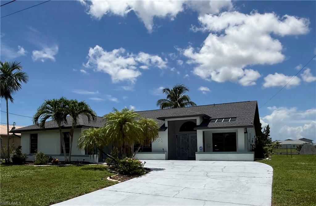 LAKEFRONT PARADISE WITH POOL, BOAT LIFT & INCREDIBLE AIRBNB POTENTIAL! 

Don't miss this rare opportunity to own an exceptional waterfront retreat on beautiful Lake Kennedy, offering direct access to a chain of 8 interconnected freshwater lakes—perfect for boating, fishing, jet skiing, kayaking, paddleboarding, and endless waterfront adventures right from your backyard.

Whether you're searching for a full-time residence, seasonal getaway, or income-producing vacation rental, this property checks every box. With potential for a highly successful vacation rental, it offers the ideal combination of lifestyle and investment all in one.

Positioned with desirable north western rear exposure, you'll enjoy spectacular Florida sunsets every evening from your screened lanai, pool, or private dock, and calming sunrises with your morning coffee. The spacious outdoor living area was designed for entertaining, with a huge pool, ample seating space, and breathtaking water views that create the ultimate tropical oasis.

Inside, the home offers a flexible floor plan with 3 bedrooms plus a den that can easily serve as a 4th bedroom, home office, or media room. Tile flooring flows throughout, while multiple sliding glass doors seamlessly connect the living room, primary suite, kitchen, and den to the outdoor living spaces. The well-appointed kitchen features stainless steel appliances, granite countertops, a breakfast nook facing the lake, and a separate formal dining area.

Boating enthusiasts will appreciate the concrete dock and boat lift, while anglers can cast a line from their own backyard. Recent updates provide peace of mind, including a new roof (2022). Best of all, no flood insurance is currently required and all assessments have been paid.

Conveniently located near shopping, restaurants, parks, fitness centers, and everyday amenities, this waterfront gem delivers the perfect blend of relaxation, recreation, and convenience.

This is more than a home—it's a lifestyle, an investment, and your own piece of Southwest Florida paradise.