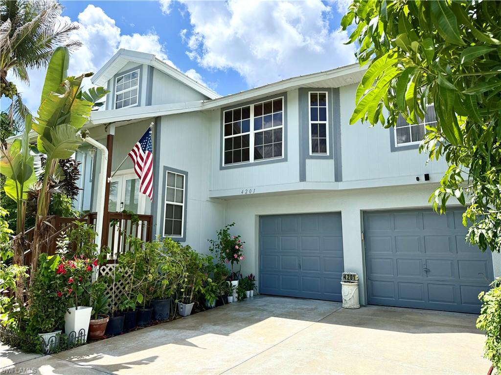 Location,Location, Locatin! 5 minutes drive to Fort Myers and shopping center , 35 minutes to Fort Myers Beach! 15 minutes to Fort Myers international Airport (RSW)! Walking distance to High school, Elementary school and public library! Split-Level floor plan with POOL and SPA. on the cooler winter night enjoy the fireplace . 4 bedrooms and 3 full baths.lower level could be used as a mother-in-law suites  as,  home has two full kitchens and dining areas. Solar system is paid in full. There are two HVAC systems on both floors, one of those systems is brand new. Home is in flood ZONE X and does NOT require flood insurance. Fenced all around the house yard. The yard is full of mature fruit trees which bear fruits in all 4 seasons, these can be good  source of extra income.Come and Take Look ! YOU WILL BE AMAZED !