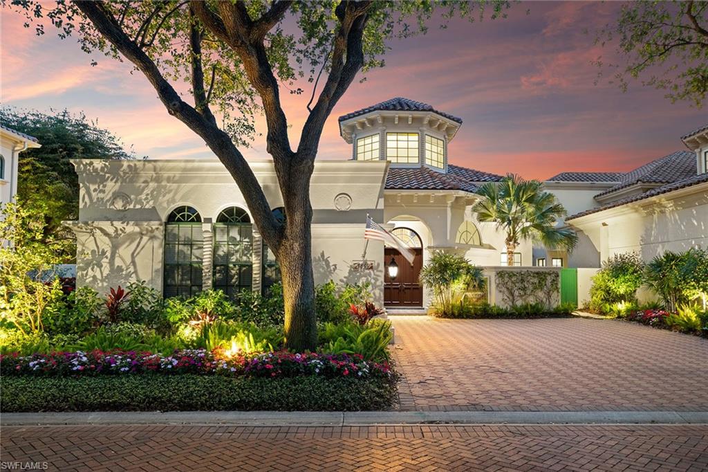 Stunning detached villa in prime location of Bay Colony, in this pet-friendly neighborhood where luxury meets tranquility. This custom remodeled masterpiece by 41 West sits on one of the largest sites in Vizcaya and boasts spectacular views of the water and mangroves, creating a serene backdrop for your everyday life. With four spacious bedrooms and four full plus two half baths, this home offers 4,583 total square feet of elegant living space. Go inside to discover gorgeous white oak wood floors that flow seamlessly throughout the open-concept design, enhancing the villa’s coastal charm. The heart of the home features a stylish gourmet kitchen ideal for culinary enthusiasts. Go outside to your private oasis, complete with a screened pool and spa, ideal for relaxing under the sun or entertaining guests. The fenced side yard is unique for a villa community. It can be an excellent space for a pet or children to play. It is beautifully landscaped and includes custom lighting, adding an enchanting touch to your outdoor space. Air-conditioned garage. Don’t miss the opportunity to own this exceptional villa in Bay Colony and enjoy all Bay Colony and Pelican Bay have to offer, including a private full-service beach club and tennis center. and state-of-the-art fitness center.