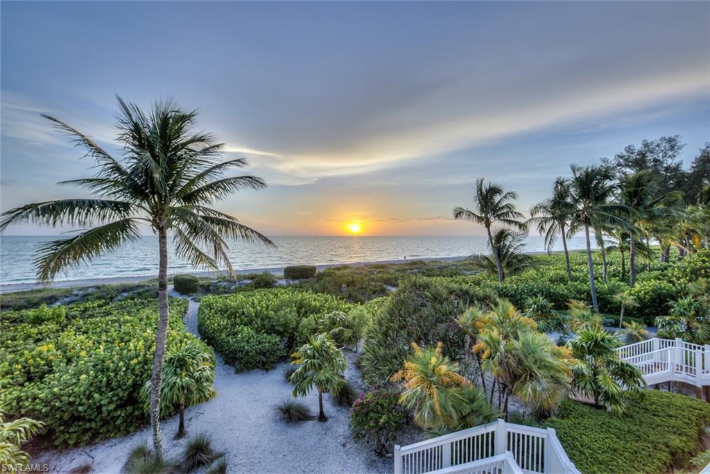 Serene Sandrift!! A place of relaxation, rest and tranquillity! Yes, indeed with this elevated two-story floor plan offering stunning views across the beach and Gulf of Mexico with the ohh-so jaw-drop Captiva Sunset! Lux, yet laid-back beachfront living situated within a low-density community known as Sandrift.Cleverly designed for easy indoor & outdoor entertaining offering essential features and a coordinating palette for this perfectly pulled-together property. Two under-building garages, oversized storage in the middle. Meant to create a happy spot of comfort and style from the foyer to the open island kitchen with a bay of windows. A natural glow illuminates the living and dining area through the walls glass of windows and doors. Main level fireplace, powder bath, and a guest bedroom with access to screen lanai. Rows of windows up the staircase to the upper level of guest bedroom with en-suite bath, laundry/utility room and the oversize master-suite and bath out to upper sun-deck.