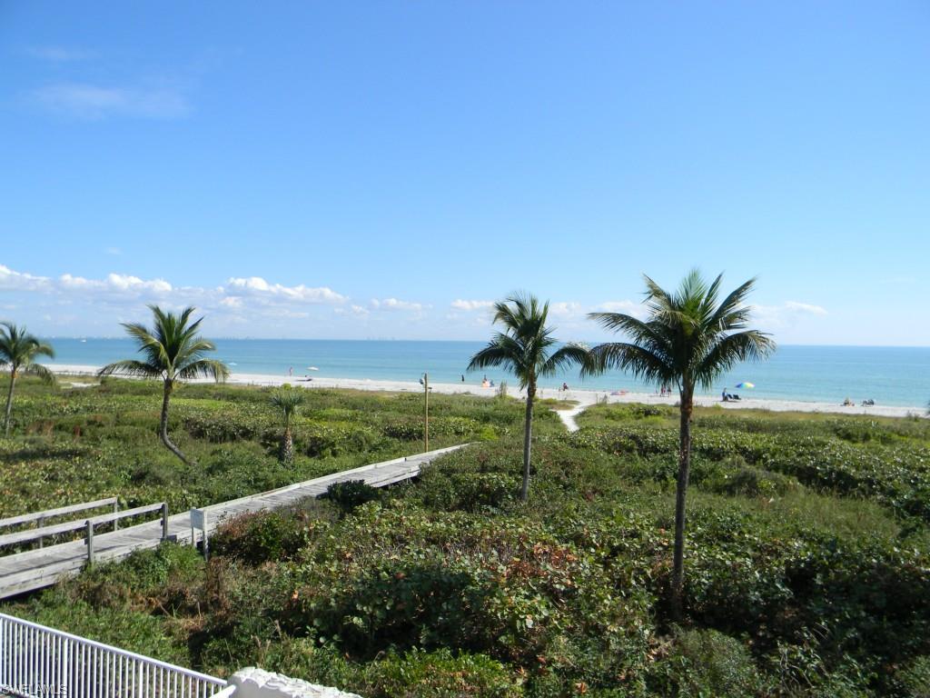 Relax and enjoy the Sanibel Beach life from this 2 bedroom, 2 bath second floor condo located one building back from the beach. Go shelling, build sand castles, relax by the pool, play tennis or dock your boat on the Gulf access canal at this resort style complex. The condo association operates an excellent on site rental program and the property management, resulting in a low 9% fee for rentals. This unit generated over 34k in 2014 and $44k in 2015, and $22k on the books for 2016.