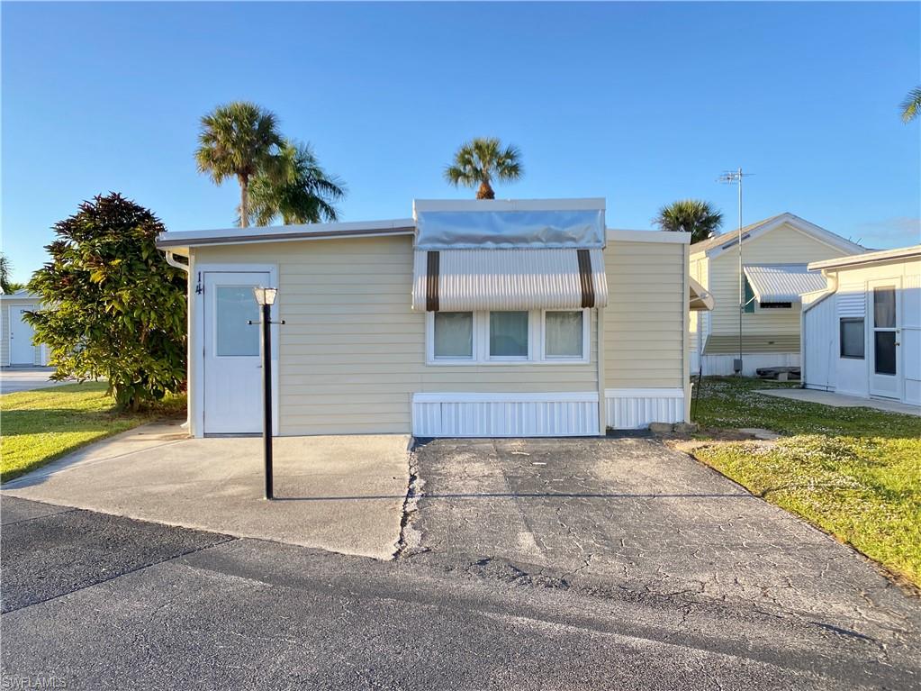 Welcome to Enchanting Shores, a boating community where you enjoy the Florida lifestyle without the high fees.  This inviting 1-bedroom, 2-bath home offers a cozy retreat in one of Naples’ most popular 55+ boating communities. Recent upgrades include a new AC (2023) and ductwork (2024).
Step inside to find wood-style flooring, a versatile Florida room with its own bath and laundry, and a kitchen with white cabinetry. 
Community amenities abound: * Heated pool, clubhouse & social room * Tennis, pickleball, shuffleboard, bocce & billiards * Boat ramp with indirect Gulf access via Henderson Creek * Hobby room, library, and more *

Located minutes from Naples and Marco Island beaches, plus shopping, dining, and everyday conveniences. This home is perfect for snowbirds or year-round residents ready to enjoy the Florida lifestyle.