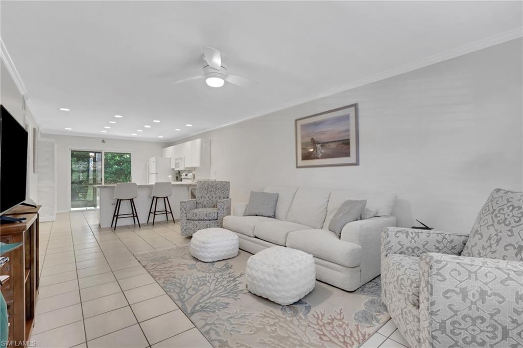 Amazing opportunity to get into this convenient location on Marco island with short distance to the esplanade shops with all the restaurants and shops and of course just minutes from the beautiful beaches on Marco Island. This 2 Bedroom 2.5 bath two story town home has had many upgrades done including recent painting, flooring, new AC, hurricane windows and much more. Priced to sell and offered furnished so just bring your suitcase. Close to the community pool. Main bedroom offers a King bed and ensuite has single vanity and shower tub combo. Guest bedroom has two bunk beds. Second bath offers single vanity with shower tub combo. A half bath on the bottom floor is available for convenience while entertaining in your open floor kitchen and living room area. A must see.