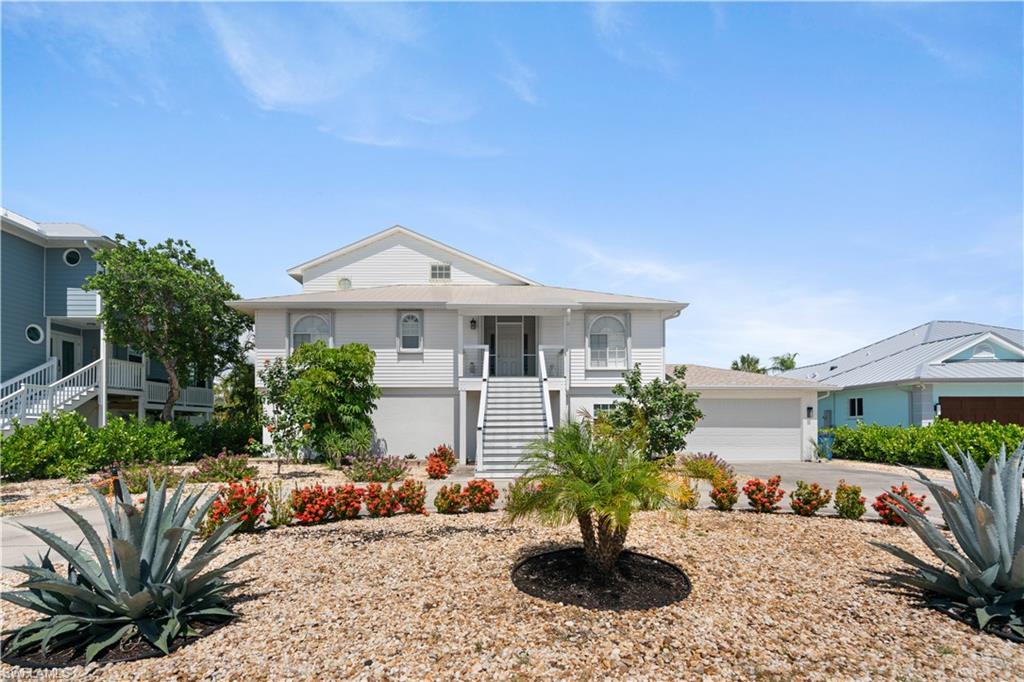 This charming 3-bedroom, 2-bathroom island-style waterfront home sits on a generous ~10,237 sq ft lot in the desirable Laguna Shores neighborhood on the south end of Fort Myers Beach.
It features a private pool with spacious outdoor entertaining areas.  Fenced back yard great for dogs. New central air condition.
Boat lift and dock on a navigable canal with seawall — enjoy quick 5–10 minute boat ride to open Gulf water or the bay. Partial Gulf views, canal views, intersecting canal, and mangrove vistas.
2-car garage plus ample parking in front, large enclosed storage space ground level under the house
Modern comfortable living spaces ideal for relaxing or hosting.
Perfect for families, boaters, and those seeking a pet-friendly retreat, this fully furnished-ready home blends comfort with coastal convenience. Whether you're watching dolphins from the deck, launching the boat for a sunset cruise, or strolling to nearby beaches, this property delivers the ultimate Fort Myers Beach lifestyle.
Prime location in a waterfront community with easy access to world-class shelling, dining, and everything the island has to offer. A rare opportunity for waterfront living with pool and boat dock in a highly sought-after area.Ideal for your next Florida getaway, investment, or full-time coastal residence.