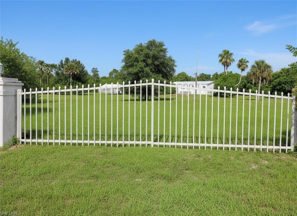 2.77 ± fenced acres featuring a 3-bedroom, 2-bath home! The property is fully fenced and gated, with a durable metal roof and a history of light use as a weekend retreat, there is also a large shipping container for storage and a carport. Zoned rural residential, it’s ideal for horses and other livestock. A perfect country escape—just about two hours from Miami or an hour from Fort Myers.